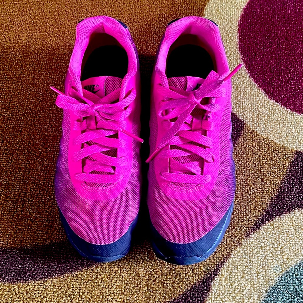 Pink and black Nike girls sneakers.